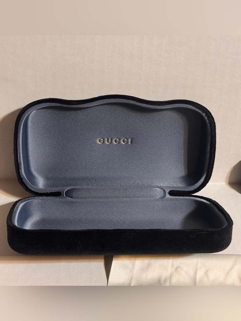 A Gucci Eyewear Case in Black and Dark Gray with Gold Logo